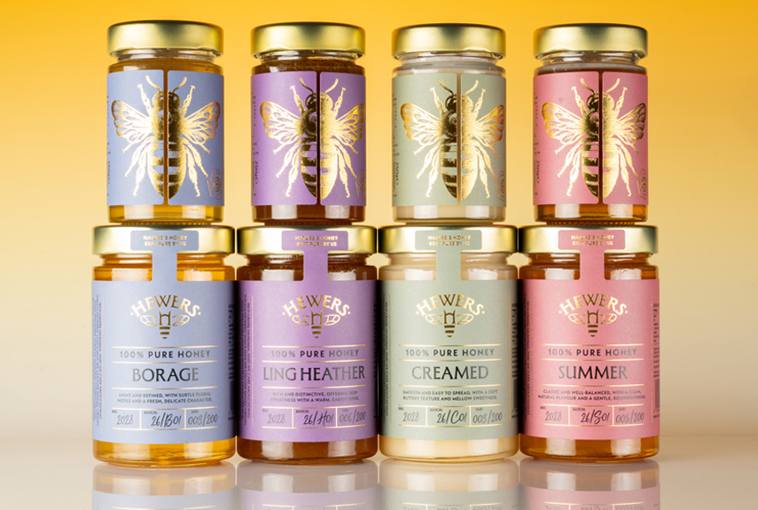 Hewers Honey Packaging, four varieties showing the back and front labelling