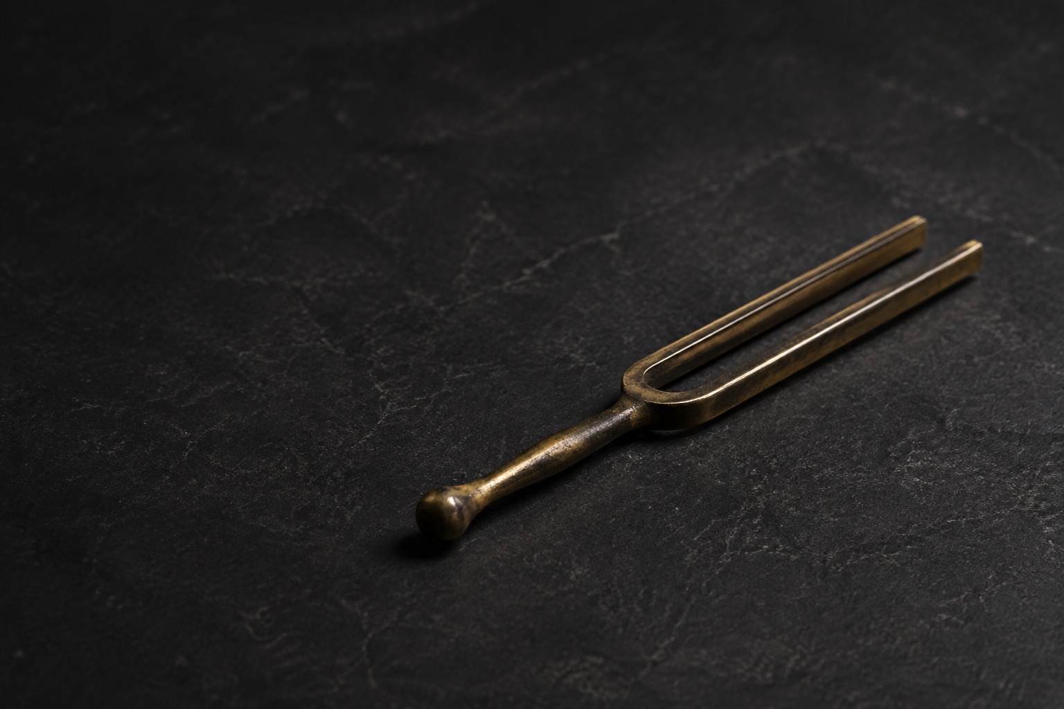 Tuned to perfection, an antique tuning fork symbolising perfect tone